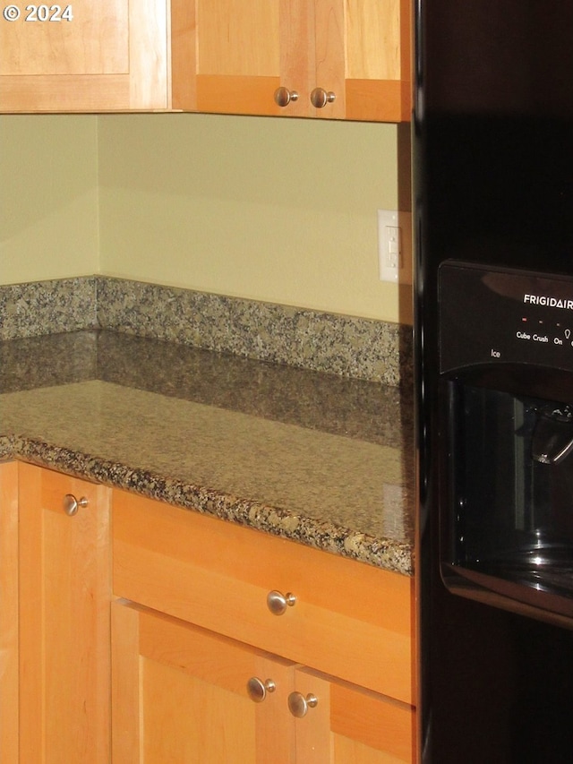 kitchen with stone counters