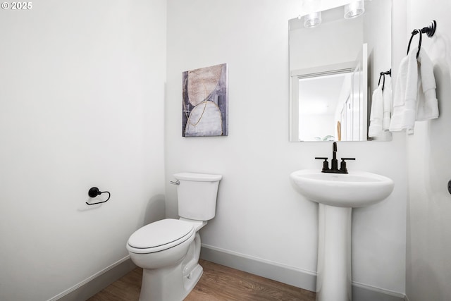 1588 NE 8th Pl, Hermiston, OR 97838 - bathroom with wood finished floors and toilet