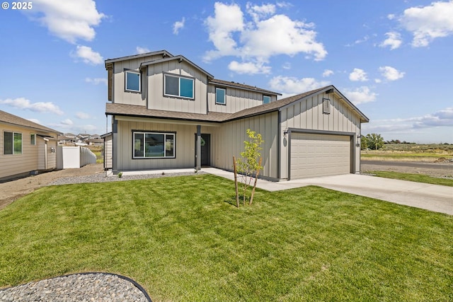1588 NE 8th Pl, Hermiston, OR 97838 - view of front of home featuring an attached garage, board and batten siding, concrete driveway, a front lawn, and roof with shingles