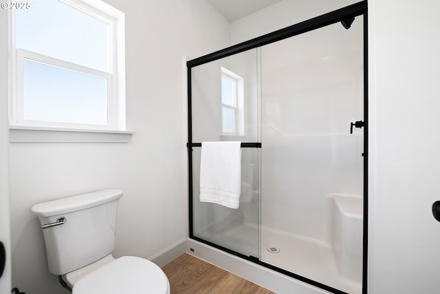 1588 NE 8th Pl, Hermiston, OR 97838 - bathroom featuring wood finished floors and a stall shower