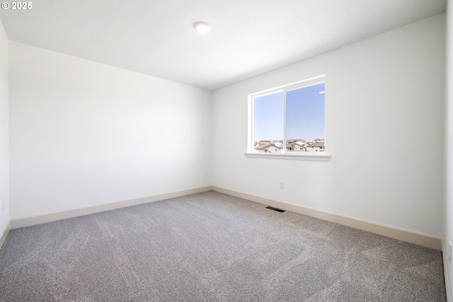 1588 NE 8th Pl, Hermiston, OR 97838 - spare room featuring carpet flooring and baseboards