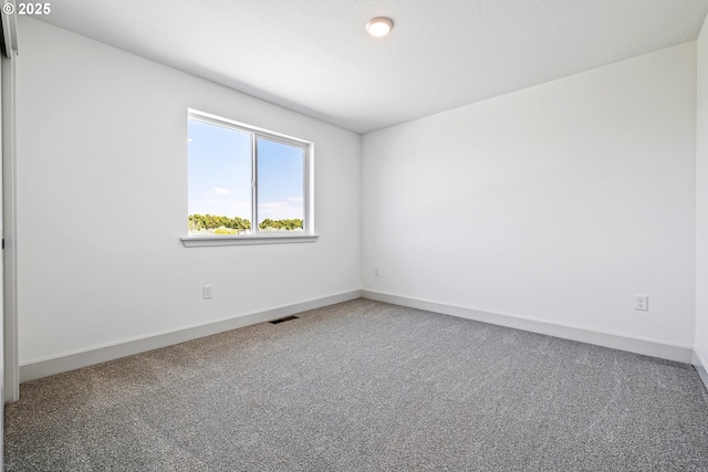 1588 NE 8th Pl, Hermiston, OR 97838 - carpeted spare room featuring baseboards
