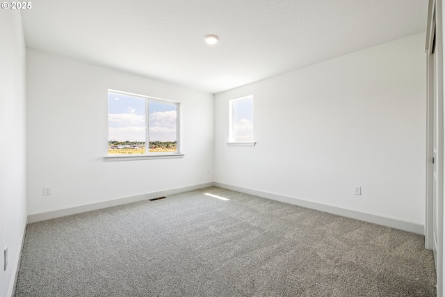1588 NE 8th Pl, Hermiston, OR 97838 - carpeted spare room with baseboards