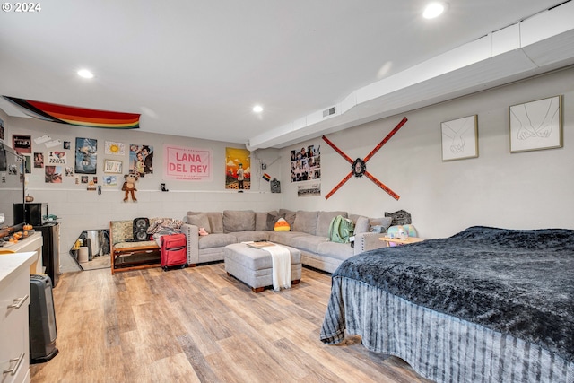 bedroom with light hardwood / wood-style floors