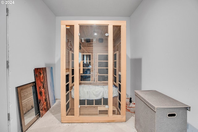 view of sauna / steam room with concrete flooring