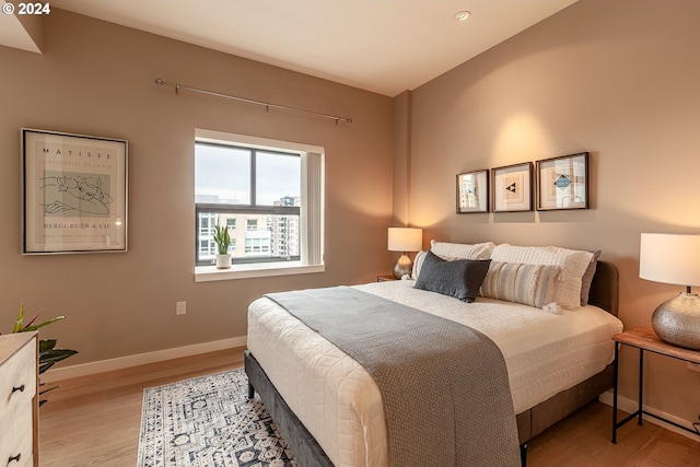 bedroom featuring light wood-type flooring