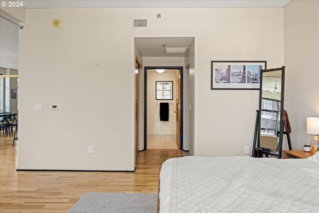 bedroom featuring light hardwood / wood-style flooring