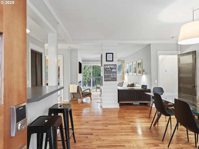 dining room with light hardwood / wood-style flooring