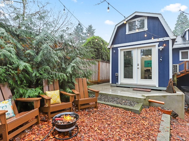 view of outbuilding featuring french doors