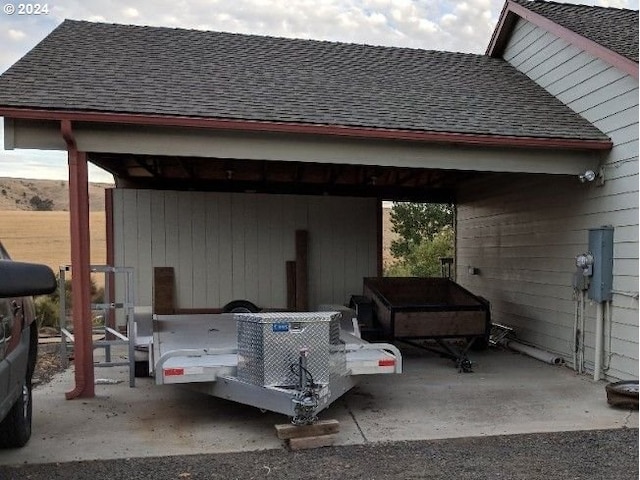 view of patio / terrace with a carport