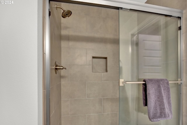 bathroom with an enclosed shower