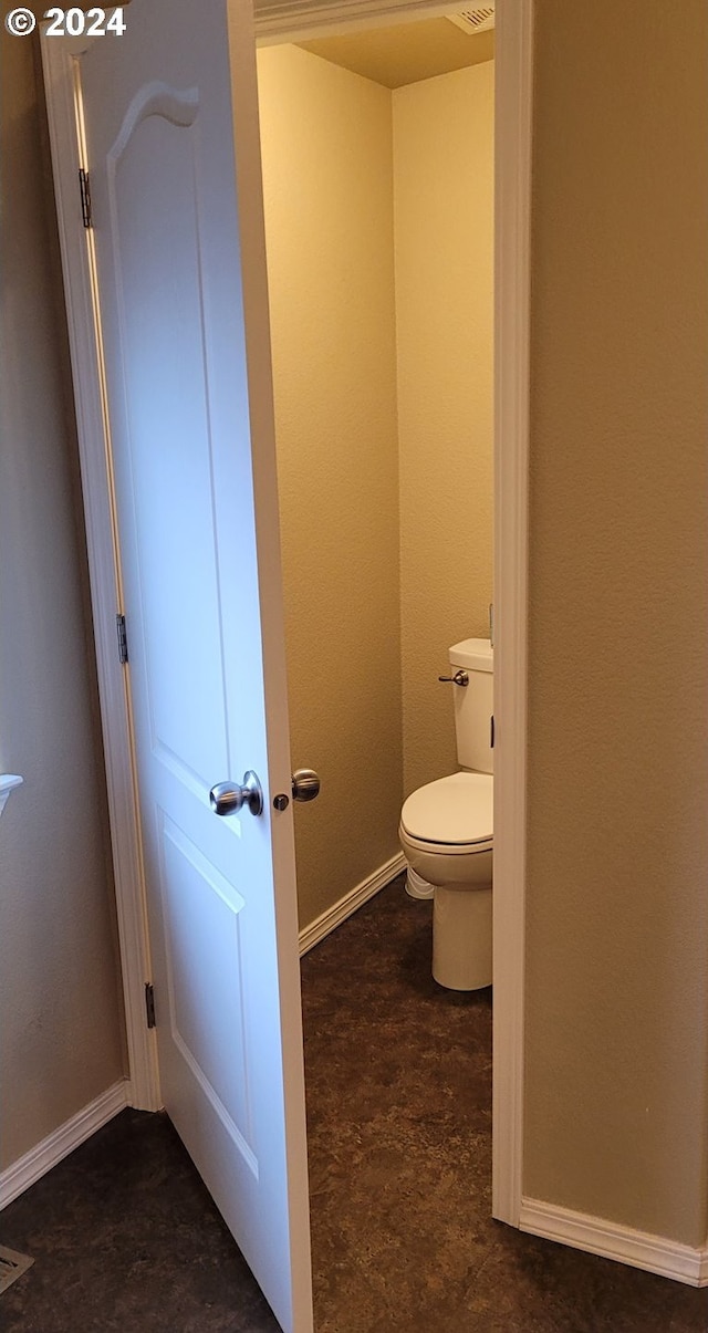 bathroom featuring toilet