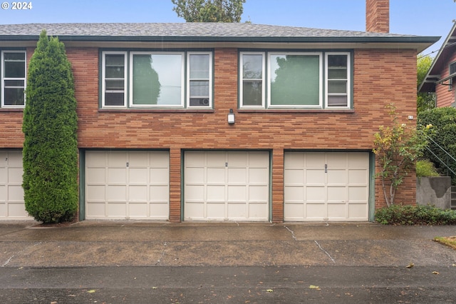 exterior space with a garage