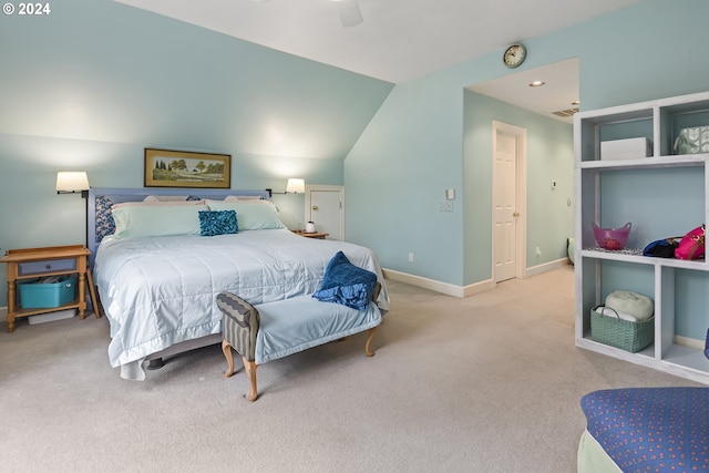 carpeted bedroom with lofted ceiling and ceiling fan