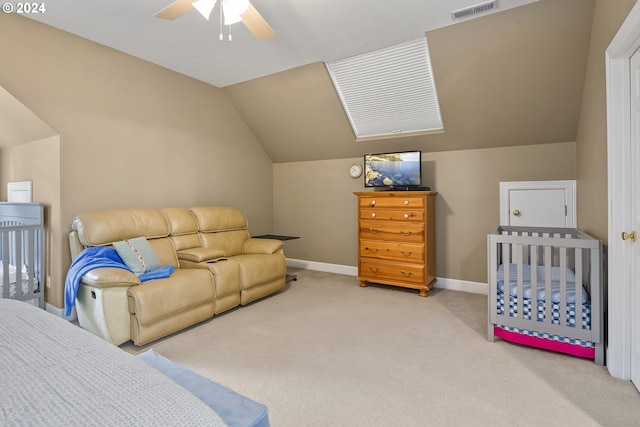 bedroom with light carpet, lofted ceiling, and ceiling fan