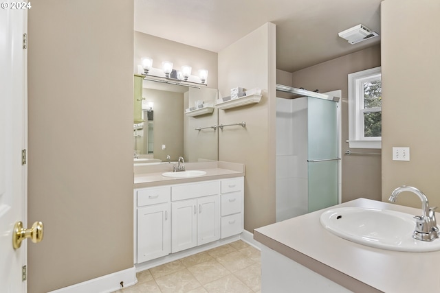 bathroom with walk in shower, tile floors, and vanity