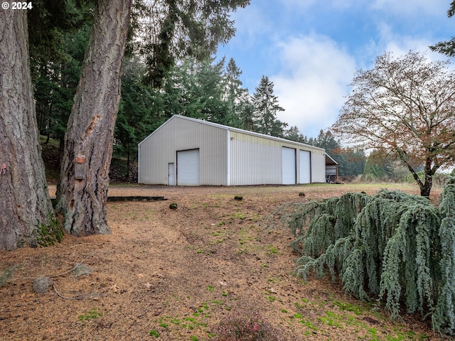 view of outdoor structure with a garage