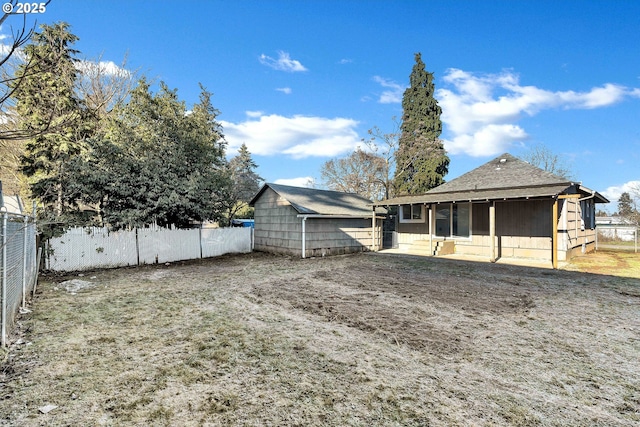 rear view of property featuring a patio area