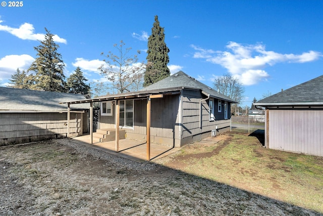 back of property featuring a patio area