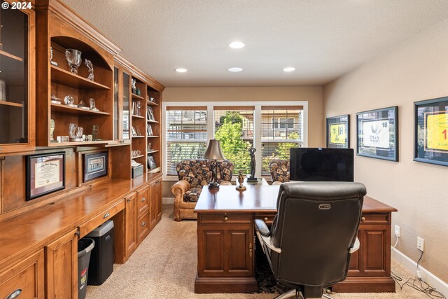 living room featuring a tiled fireplace and dark hardwood / wood-style floors