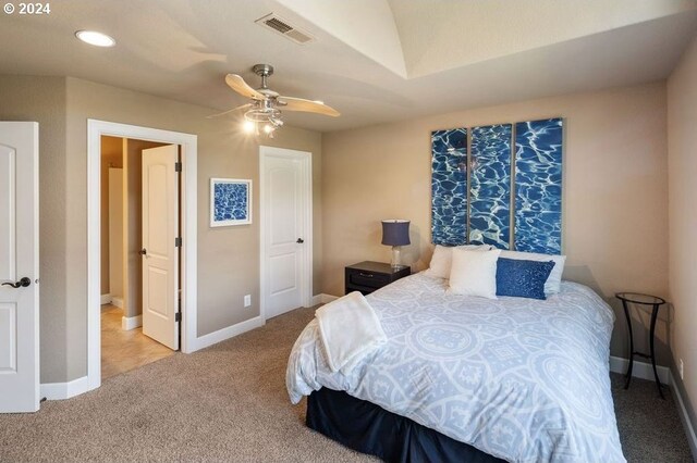 bathroom featuring ceiling fan with notable chandelier, vanity, and tile patterned floors