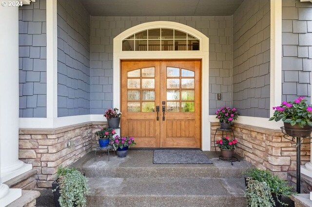 doorway to property with french doors