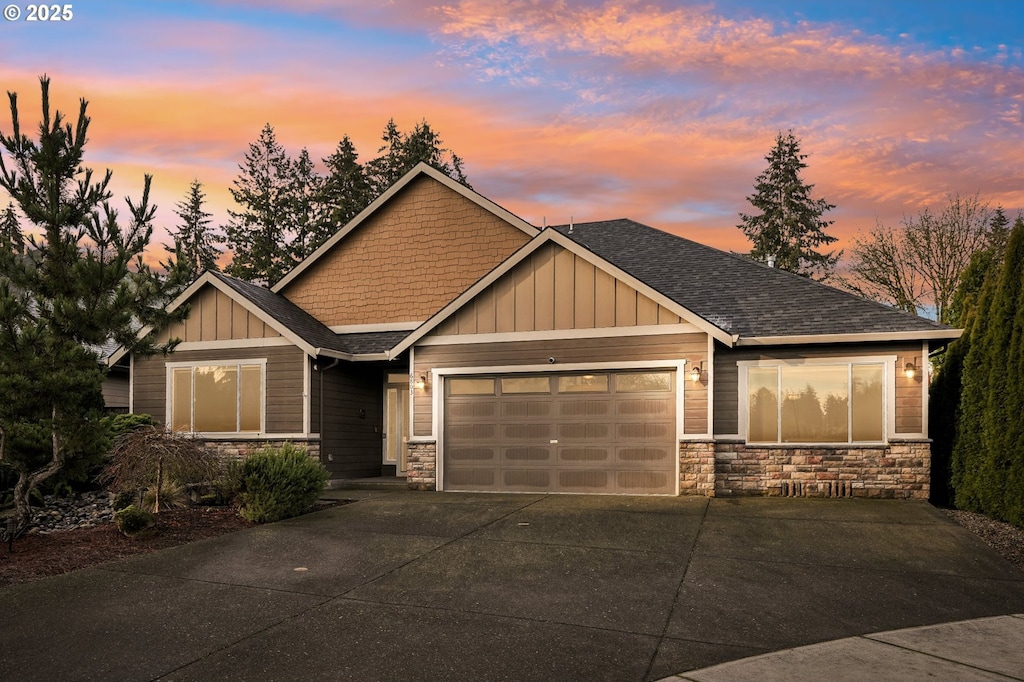 craftsman inspired home featuring a garage