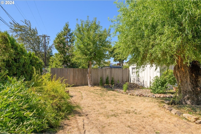 view of yard with fence