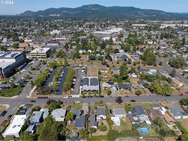 birds eye view of property featuring a residential view and a mountain view