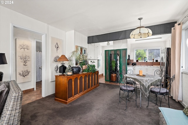 dining room featuring carpet and tile patterned floors