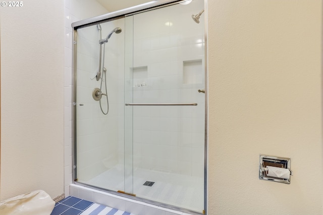 bathroom with a stall shower