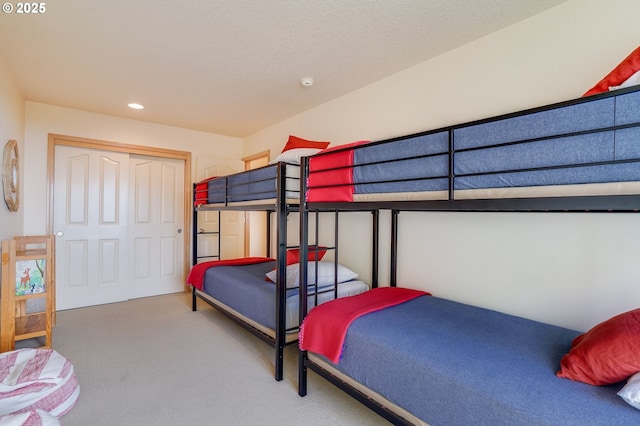 bedroom featuring carpet and recessed lighting