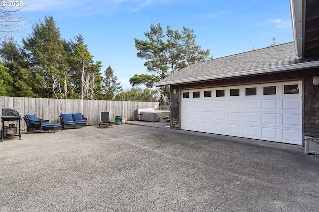 garage featuring fence