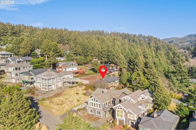 bird's eye view with a residential view and a view of trees