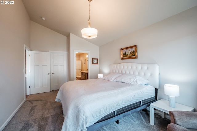 carpeted bedroom with vaulted ceiling