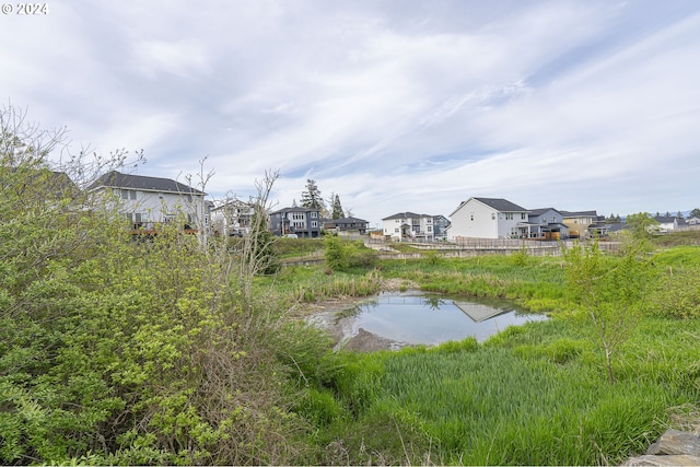 view of yard with a water view