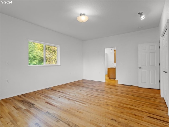 12405 SW Poppy Dr, Gaston, OR 97119 - unfurnished bedroom featuring light wood-style floors and ensuite bath