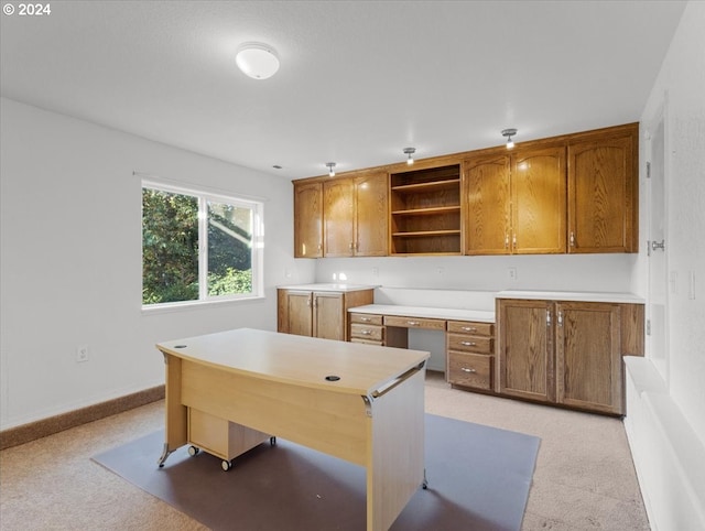 12405 SW Poppy Dr, Gaston, OR 97119 - kitchen featuring open shelves, light carpet, brown cabinetry, and light countertops