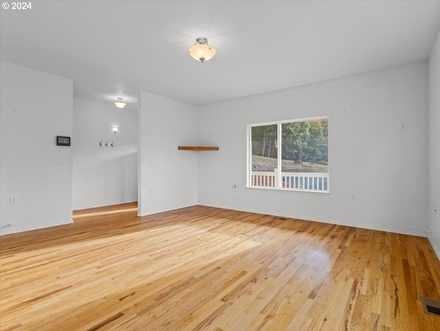 12405 SW Poppy Dr, Gaston, OR 97119 - unfurnished room with wood finished floors