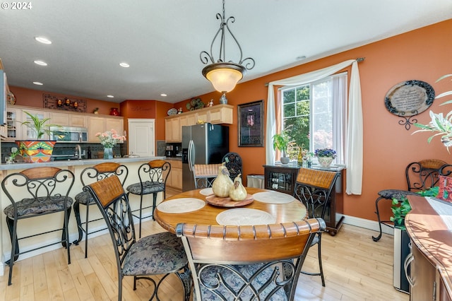 dining area featuring light hardwood / wood-style floors