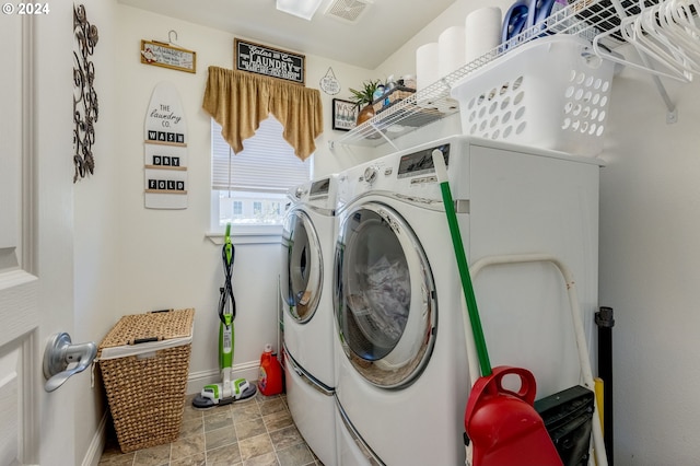 laundry room with washer and dryer