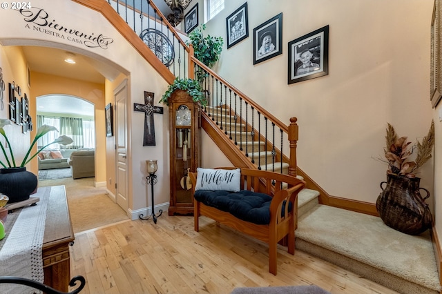 staircase featuring hardwood / wood-style floors