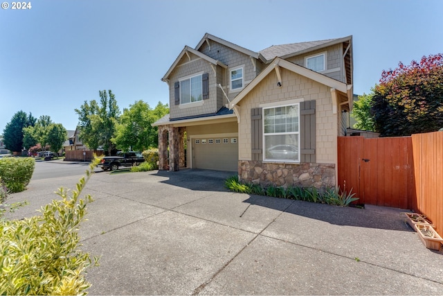 craftsman-style house featuring a garage