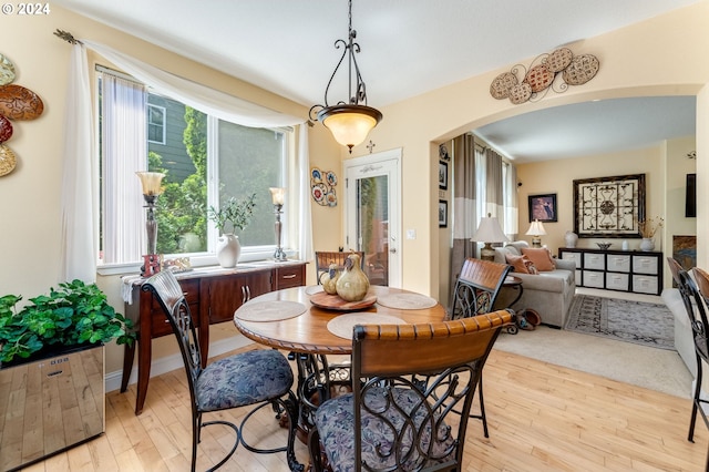 dining room with light wood-type flooring