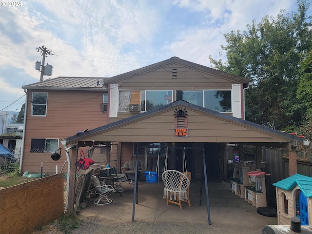 back of house with a patio area