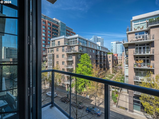 balcony featuring a view of city