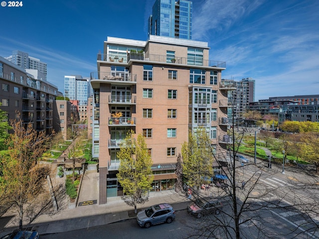 view of building exterior featuring a view of city