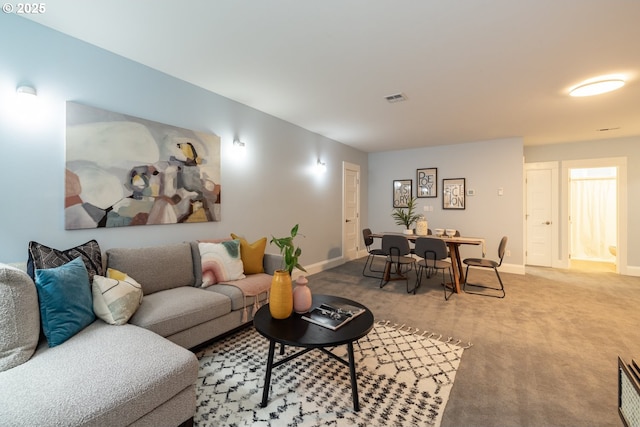 living room featuring carpet floors