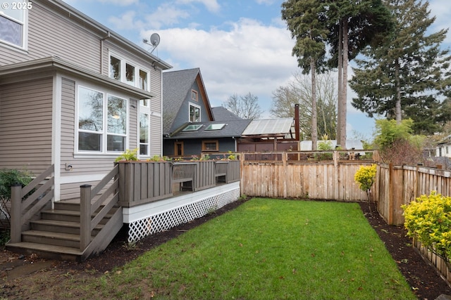 view of yard with a deck