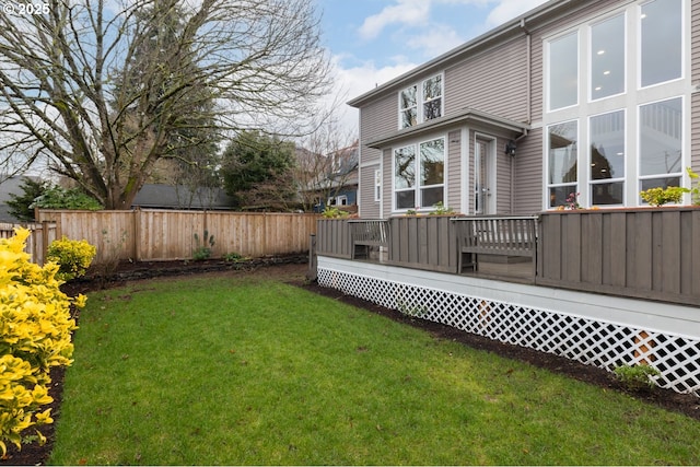 view of yard with a wooden deck